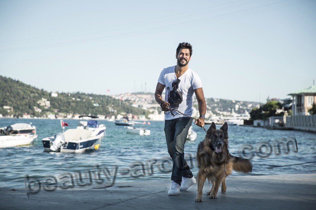 Burak Ozcivit photo with dog