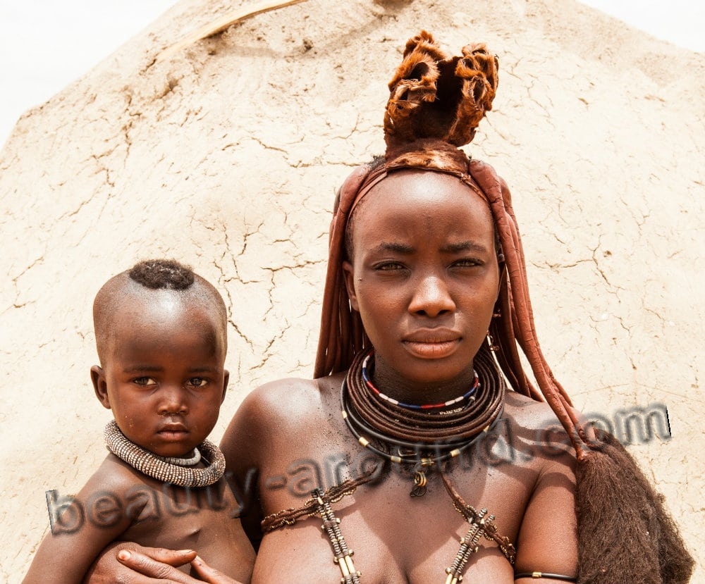 Himba women with child photo