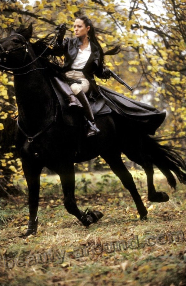 Angelina Jolie on horseback photos