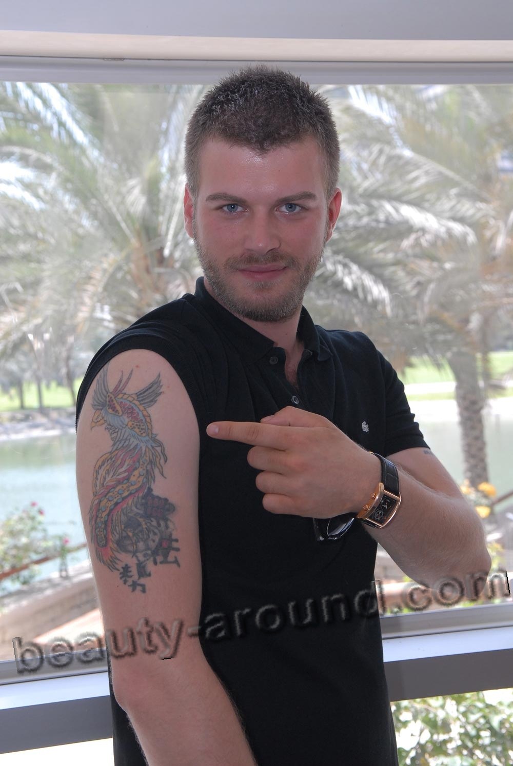 Kivanc Tatlitug Turkish actor, model,photo with a tattoo