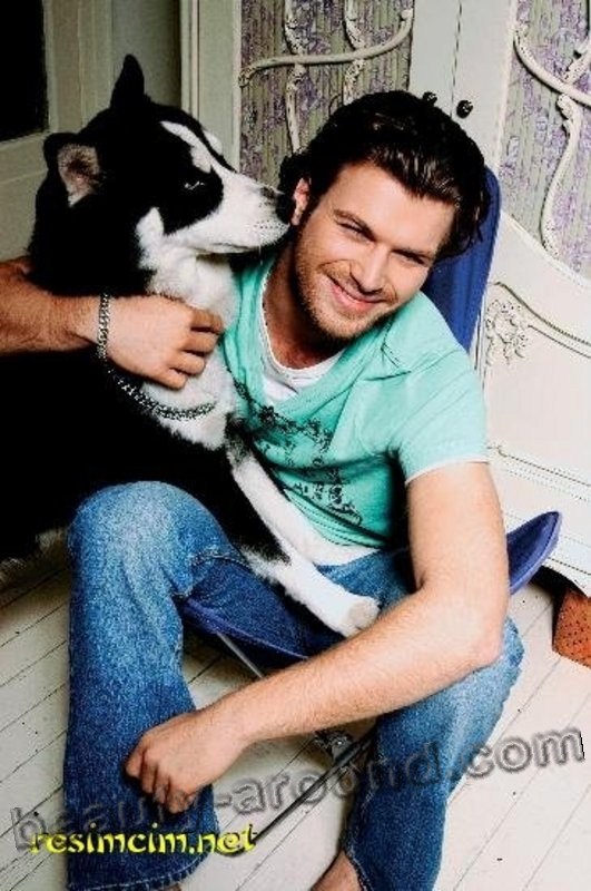 Kivanc Tatlitug Turkish actor, model, photo with dog