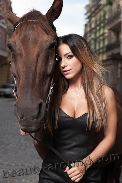 Ukrainian singer Ani Lorak with horse photos